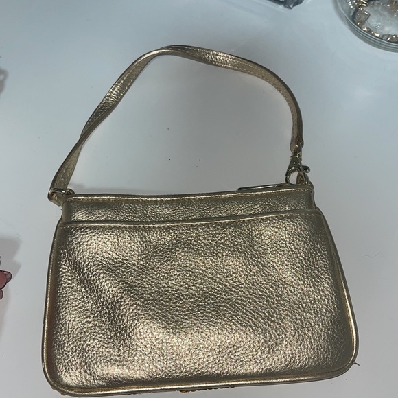 Gold Michael Kor’s wristlet. - Picture 4 of 6